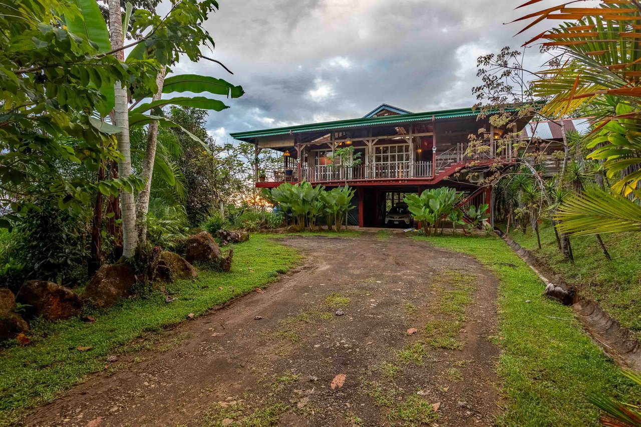 A Handcrafted Residence Immersed in Nature Above the Canopy Ocean View Architectural Home