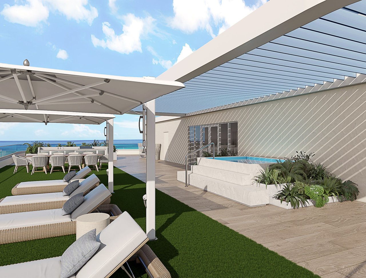 Ocean 580 rooftop lounge rendering with loungers, umbrellas and ocean views.