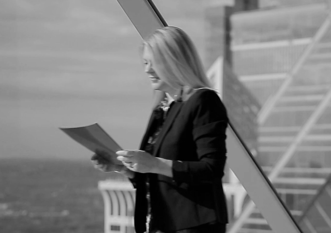 Professional real estate advisor Stephanie Biello delivering an industry leader on market intelligence and fiduciary excellence at The Resedences at Two Liberty Penthouse.