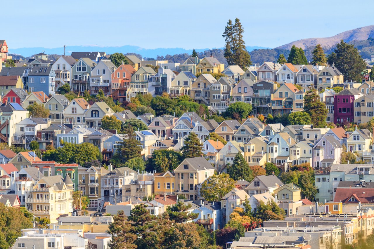 A hillside view of San Francisco homes in a quiet neighborhood.