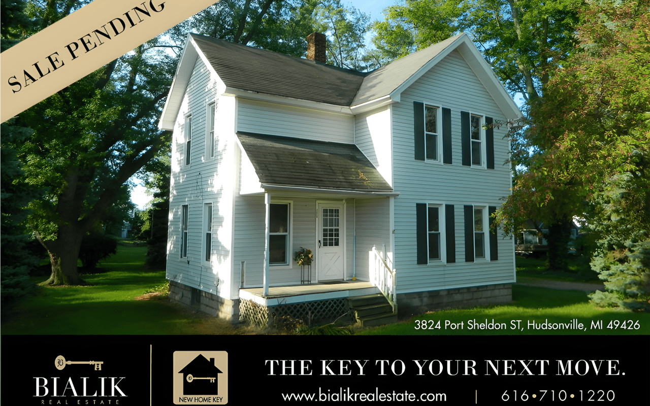 Sale-pending white farmhouse at 3824 Port Sheldon Street in Hudsonville, featured in a Bialik Real Estate graphic.