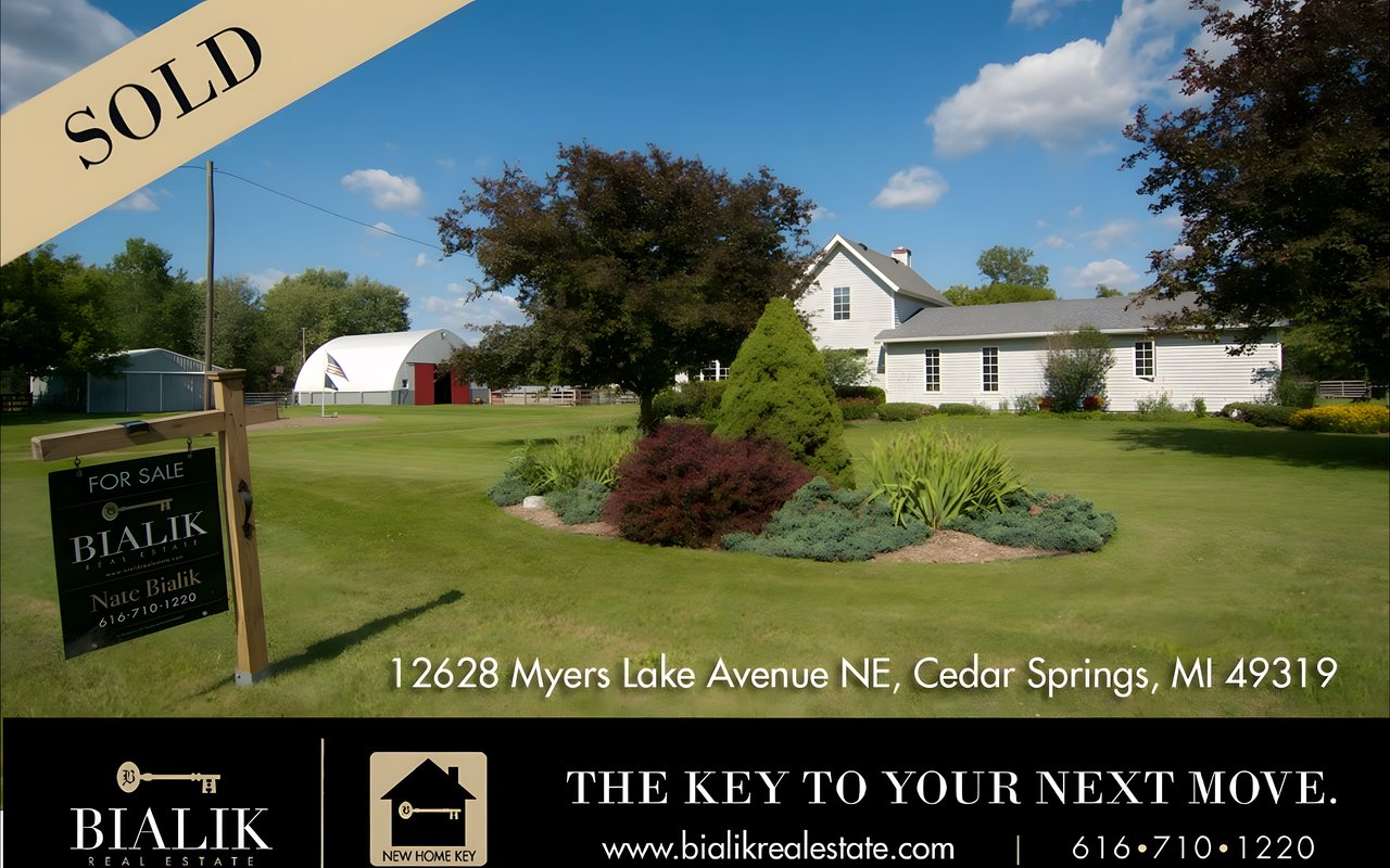 Sold announcement for a white Cedar Springs home, with the property address and Bialik Real Estate contact details.