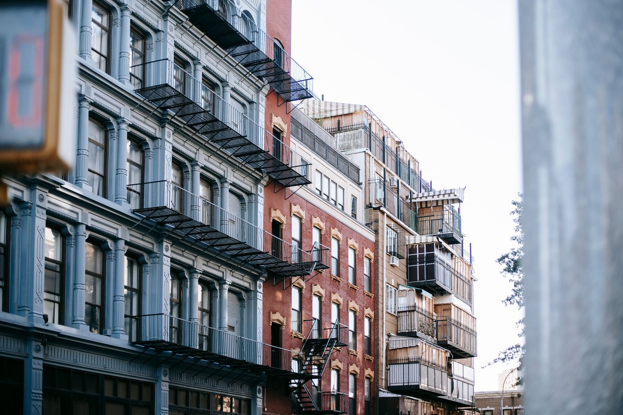 Cortlandt Alley preserves nineteenth-century commercial architecture, including historic warehouses, industrial fire escapes, and surviving Belgian block paving.
