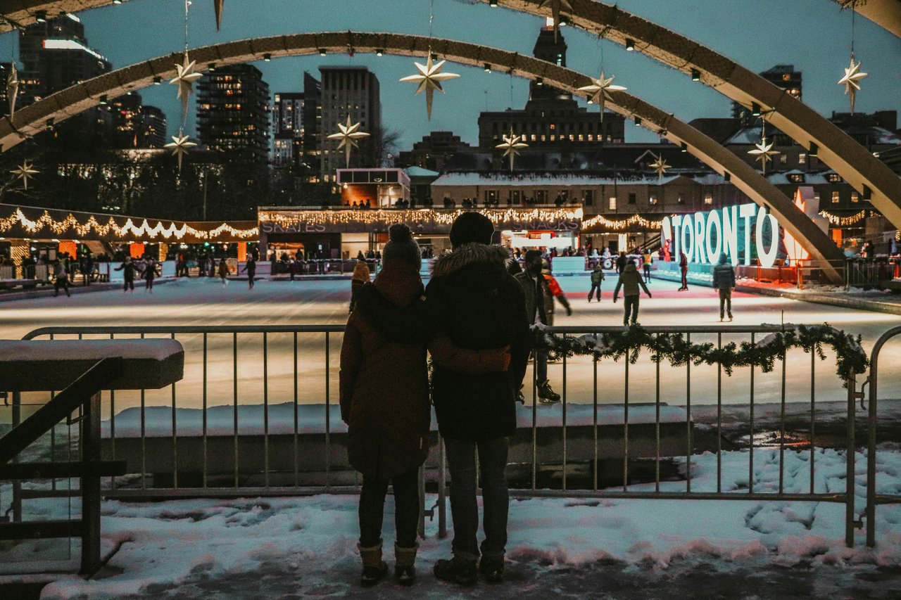 Toronto skyline and skating rink symbolizing lifestyle appeal