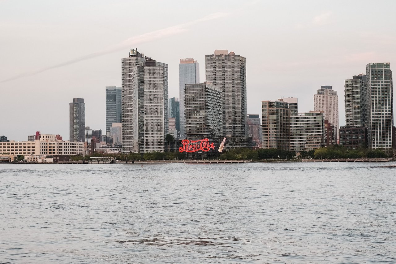 Skyline Tower at 3 Court Square in Long Island City, Queens, featuring luxury condominiums, panoramic skyline views, contemporary glass architecture, and world-class amenities.
