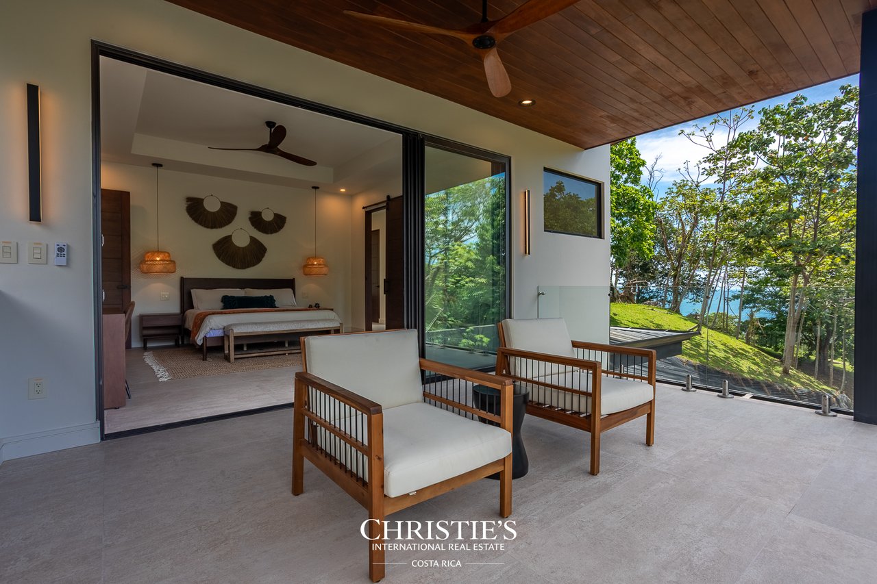Modern Tropical Ocean & Mountain View Home