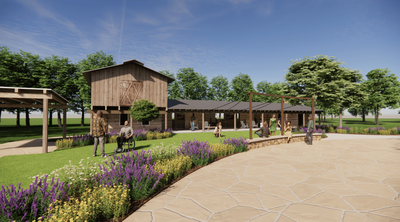 Rendered community pavilion with a timber barn-style tower, flower beds, and a broad stone patio.