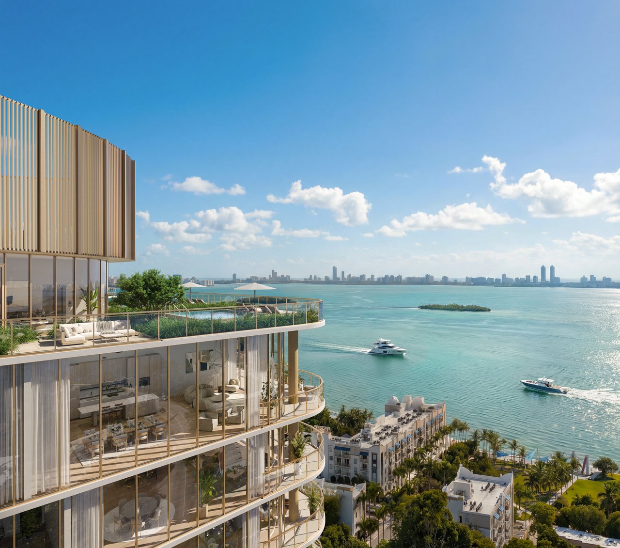 Kempinski Residences tower with curved glass terraces overlooking Biscayne Bay and the Miami skyline.