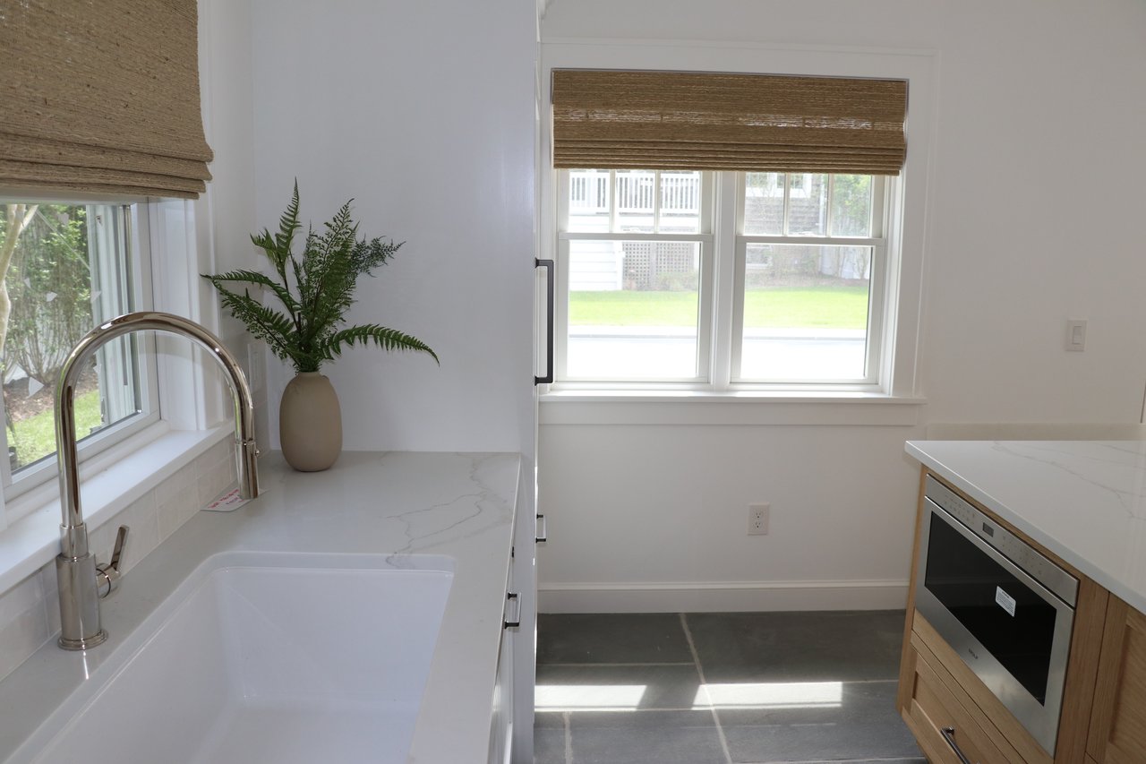 A Classic Bay Header with a Pool House