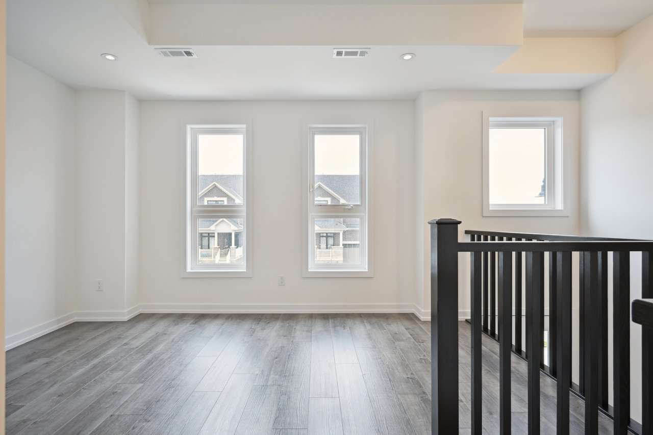 Brand-new, never-lived-in stacked townhome