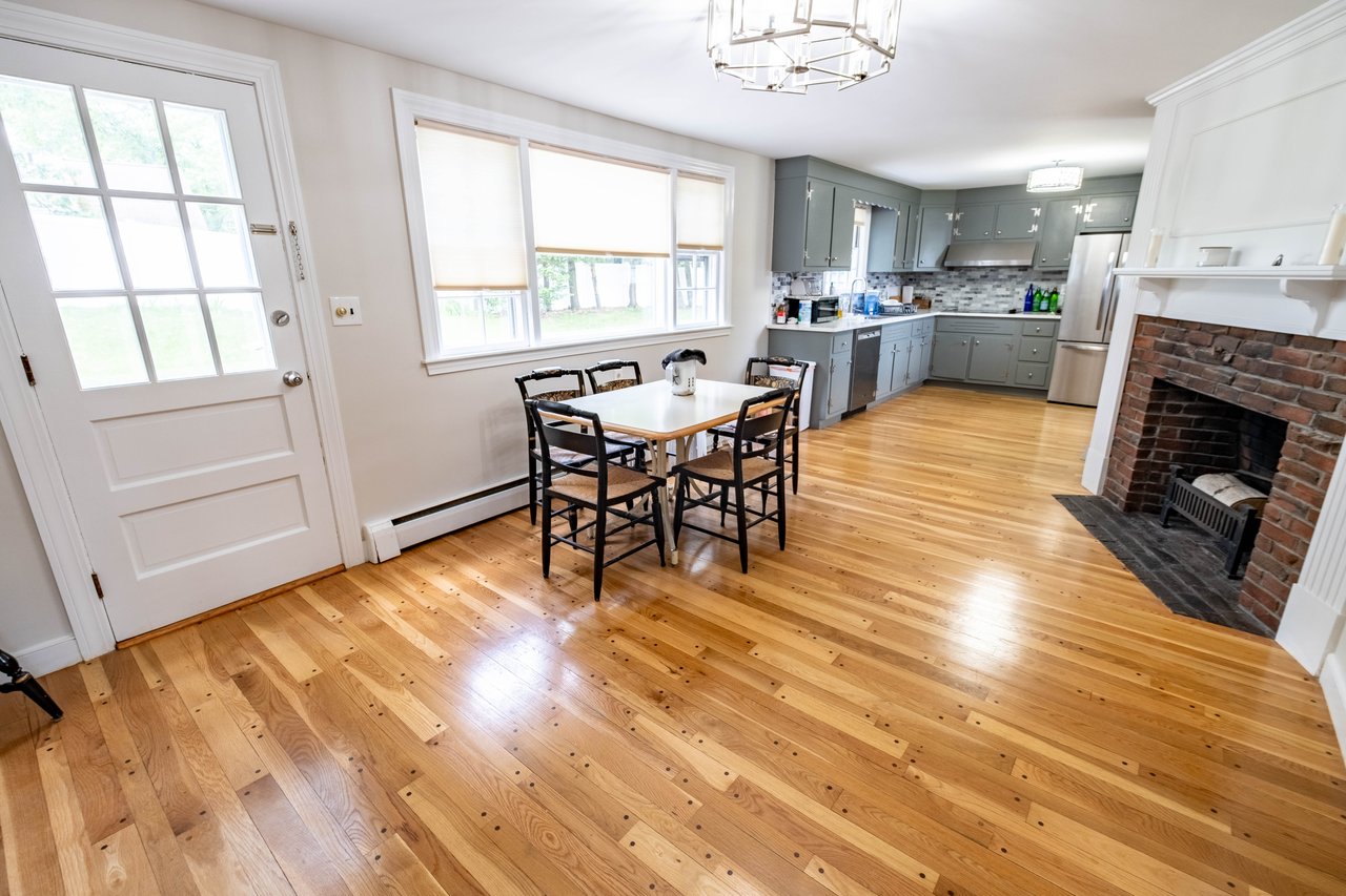 Dining room with wood-burning fireplace