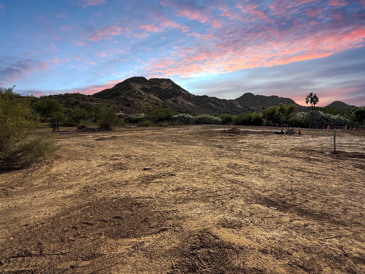 Vacant, 1.3-acre, dirt lot with Mummy Mountain behind, in Silver Sky Paradise Valley