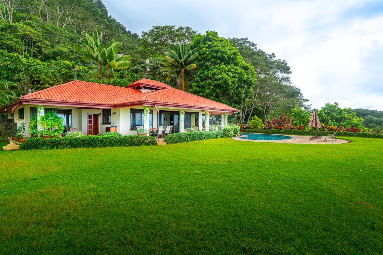 Ocean, jungle & mountain views on a meticulously landscaped 3-home family compound