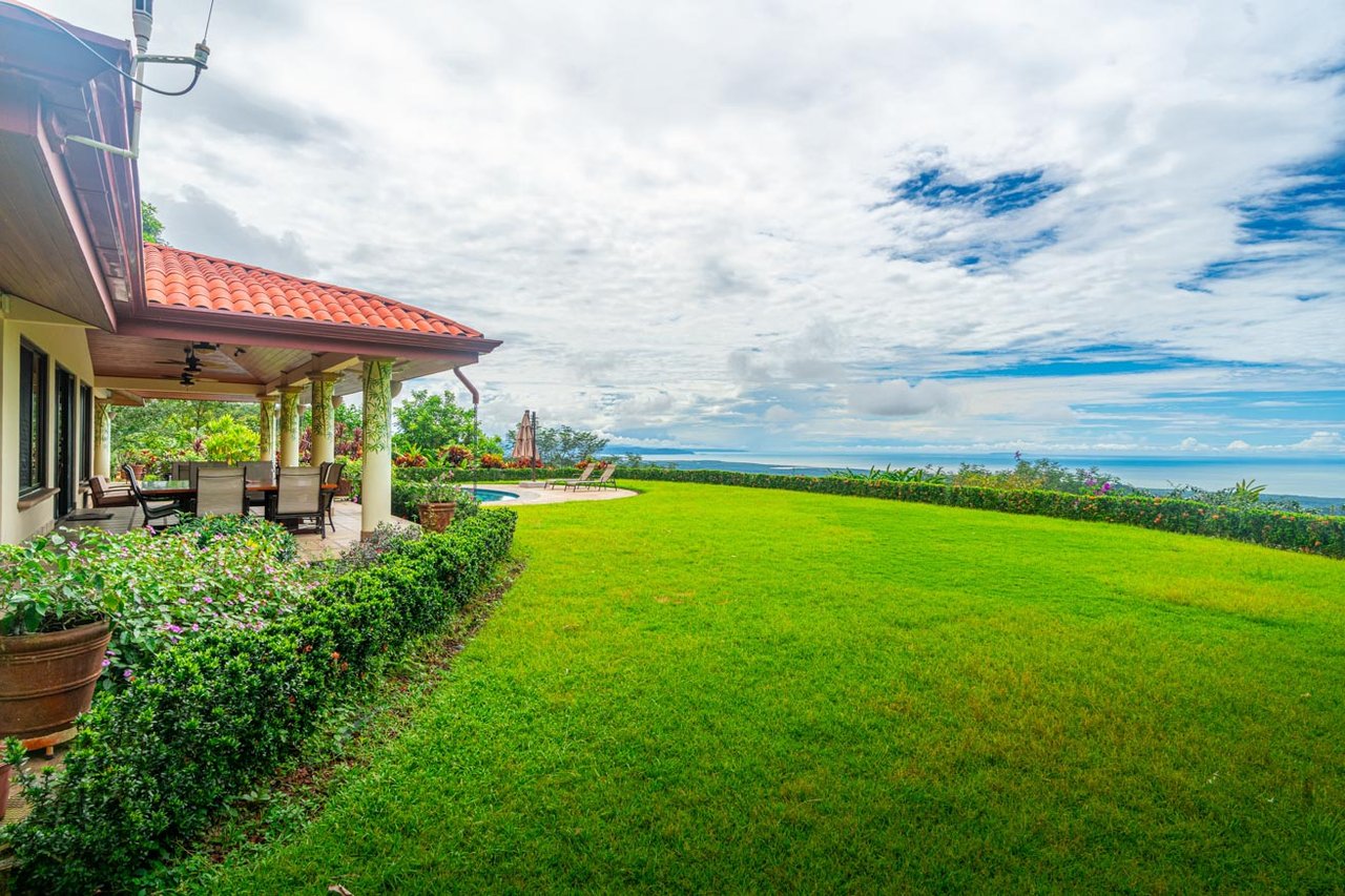 Ocean, jungle & mountain views on a meticulously landscaped 3-home family compound