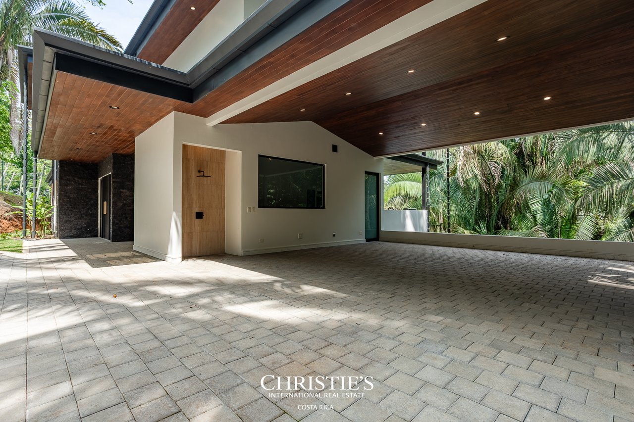 Modern Tropical Ocean & Mountain View Home