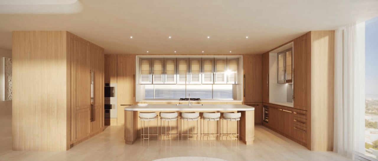 Contemporary kitchen with warm wood cabinetry, a large island, and five bar stools.
