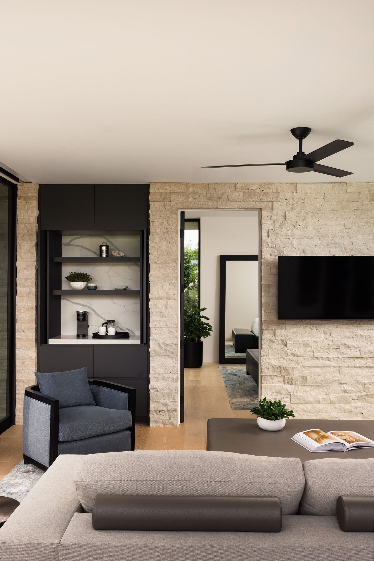 Modern luxury home in Paradise Valley with resort-style backyard, pool, fire feature, and contemporary architecture at sunset.