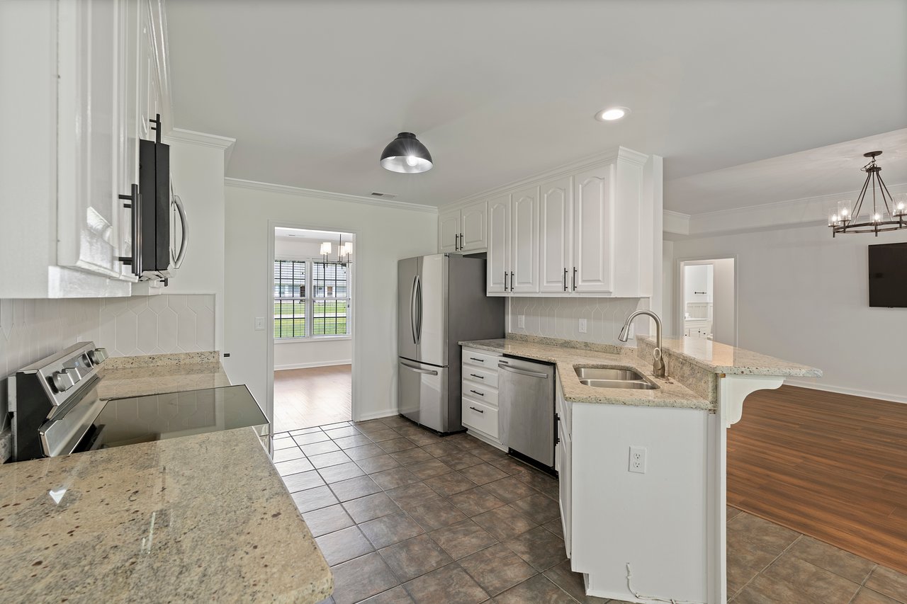 Updated Four Bedroom Home in Harvest!