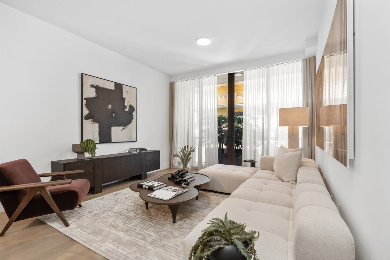 Arbor Coconut Grove residence living room with balcony and abstract artwork