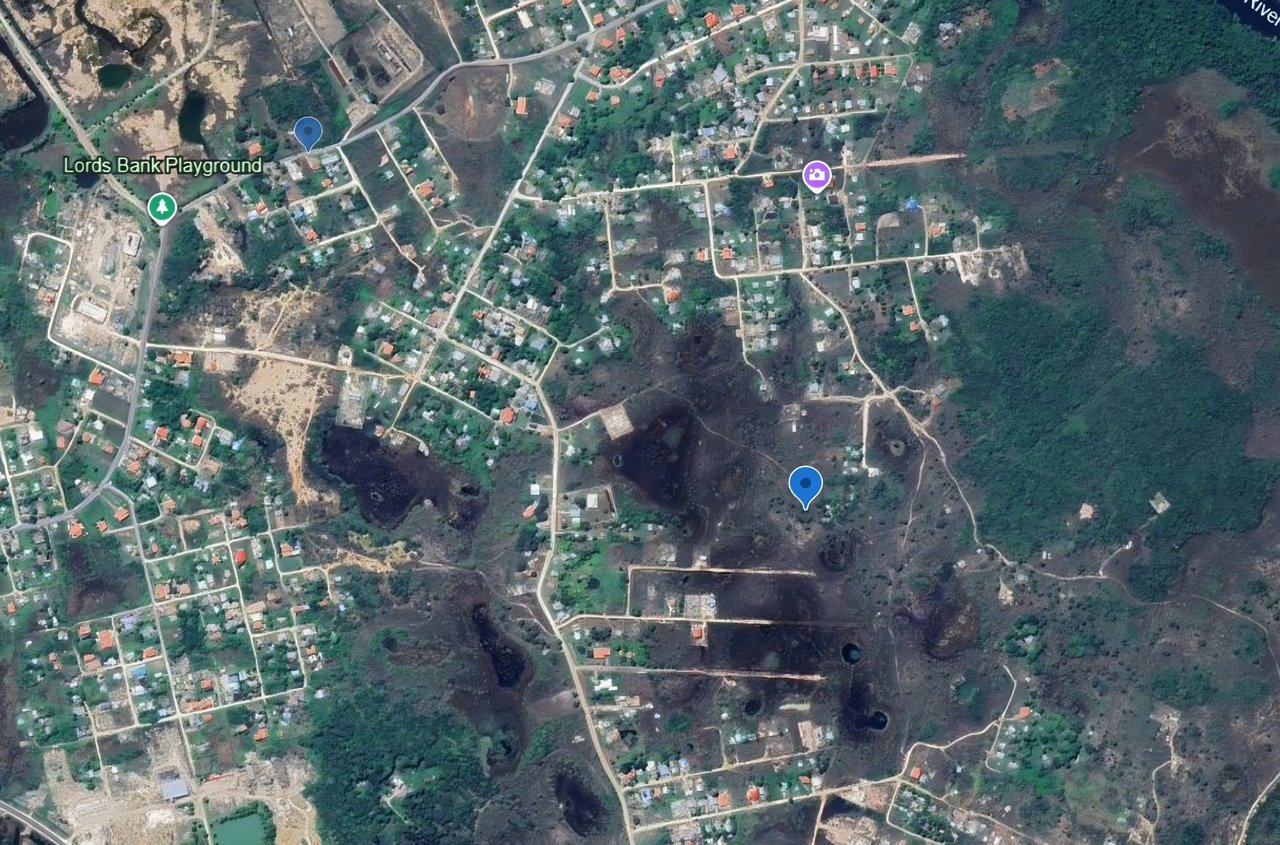 Vacant Residential Lot | Lords Bank, Belize District | Old Well Area Lot Size: 80' x 100' (8,000 sq ft) | 20 Ft Above Sea Level | Clear Title Asking Price: USD $14,000 | BZD $28,000