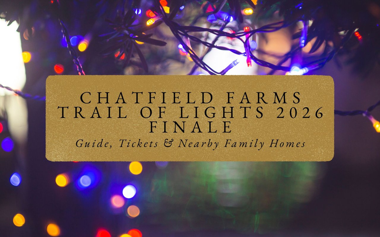 Glowing archway entrance to Chatfield Farms Trail of Lights, families bundled up walking path lined with colorful holiday bulbs.