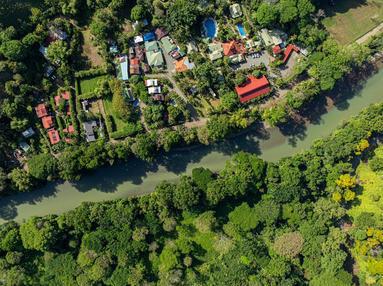 0.50 ACRES – 5 Bedroom Riverfront Modern Home, Walking Distance To Dominical!!!