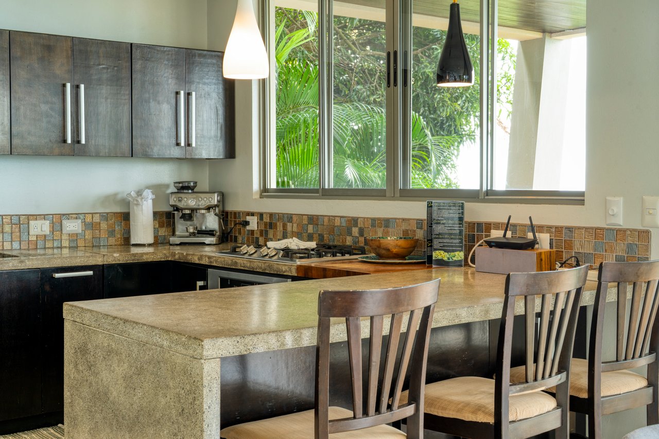 A Modern Jungle Haven with Panoramic Whales Tail Views