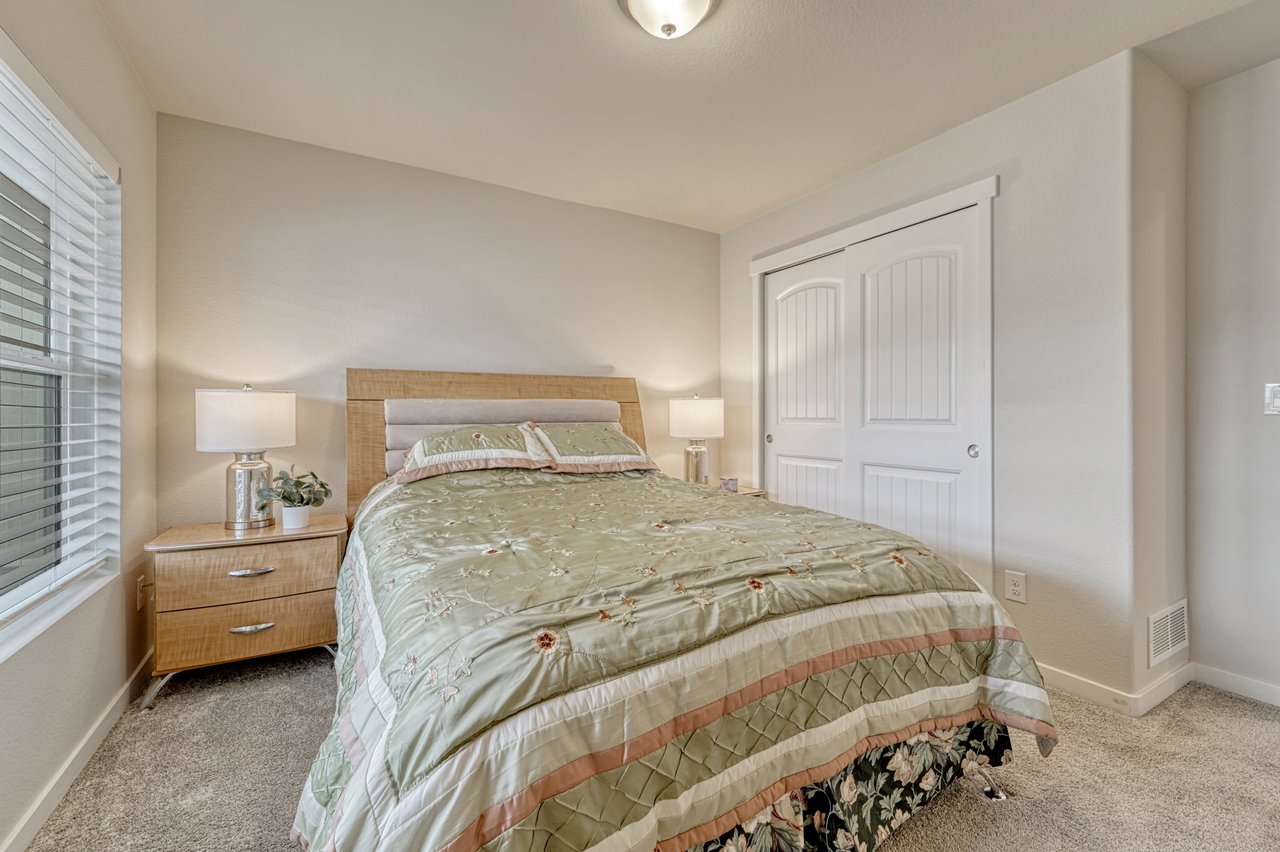 Main-level bedroom with double-door closet