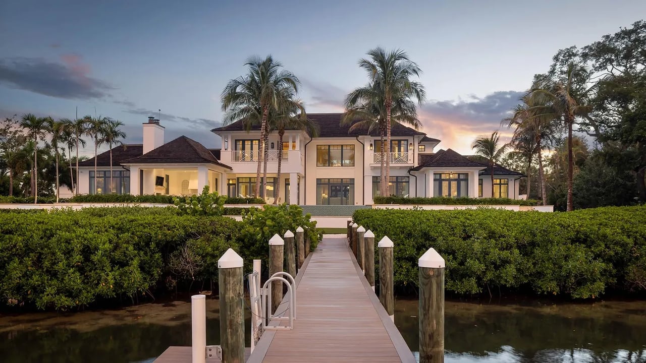 Cinematic beauty inside and out make this charming estate the toast of Sarasota.
