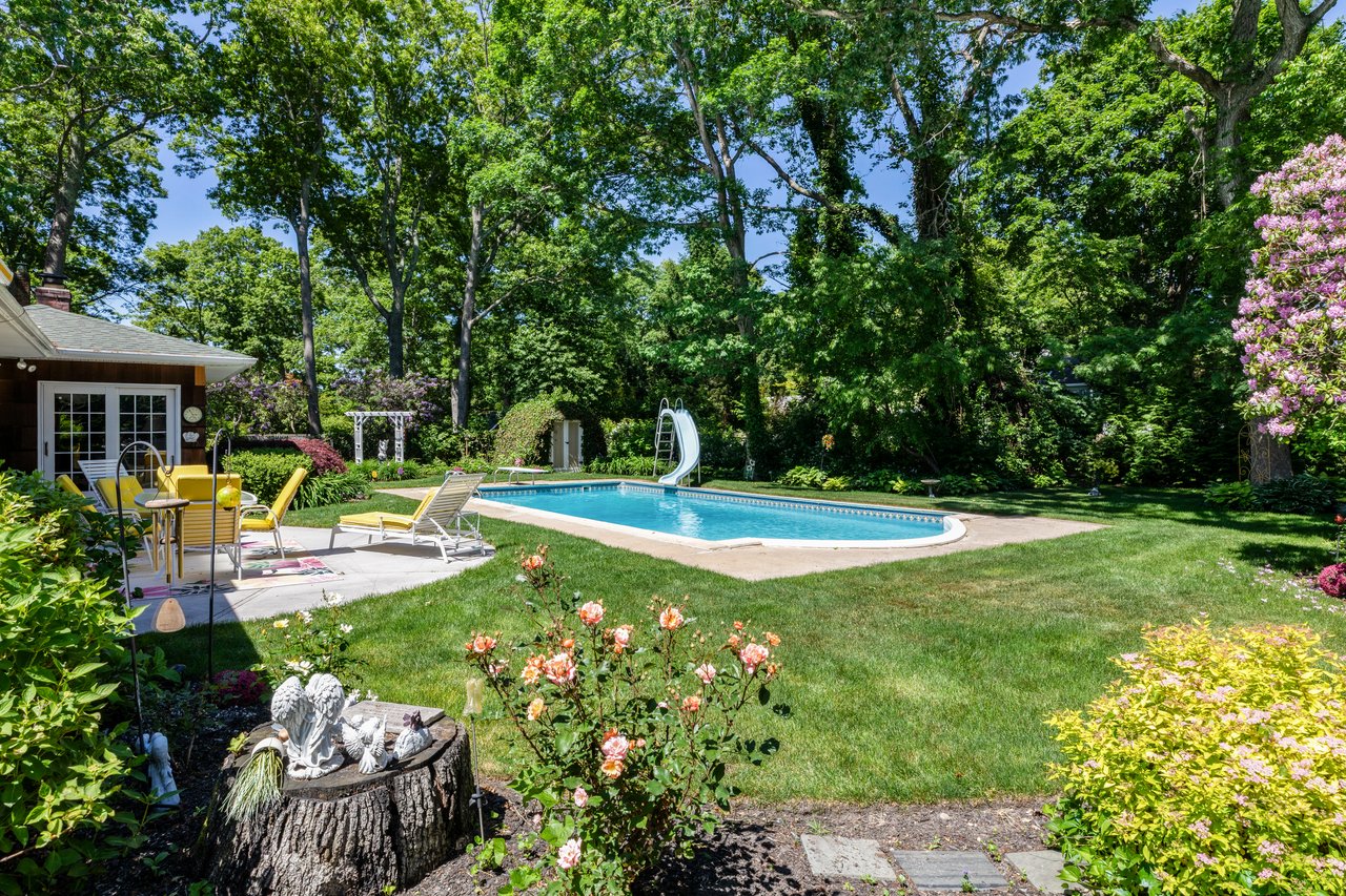 A Quiet Village Setting with a Pool at Its Center
