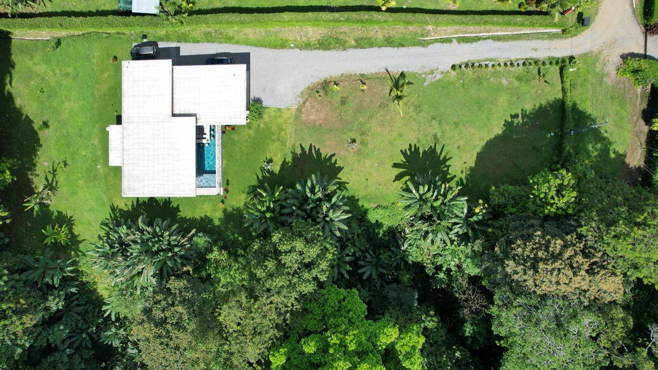 Stunning New Modern Home in Ojochal – Usable Lot Surrounded by Jungle and Creeks