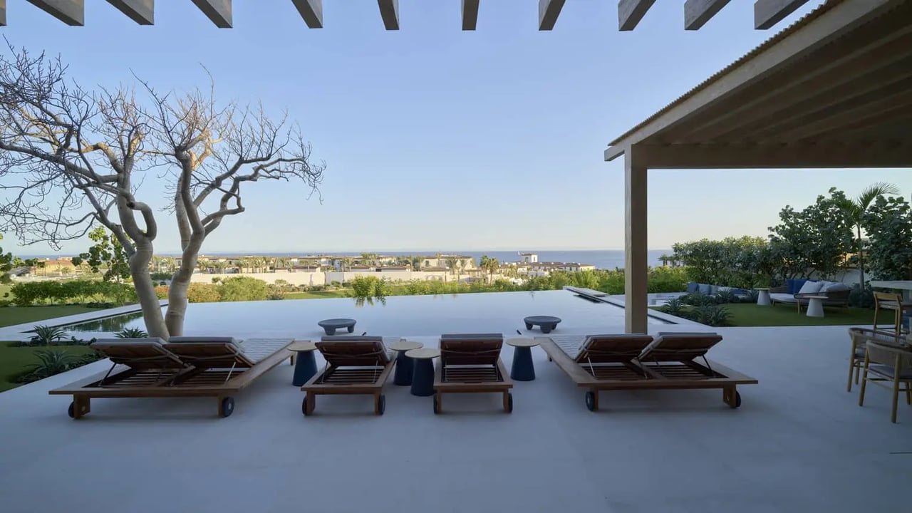 Four Seasons Cabo beachfront branded villas with private coastal access, premium finishes, and resort-style amenities
