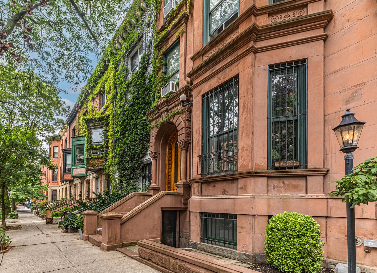 Historic brownstones, townhouses, and multifamily homes along Madison Street in Bedford-Stuyvesant, Brooklyn.