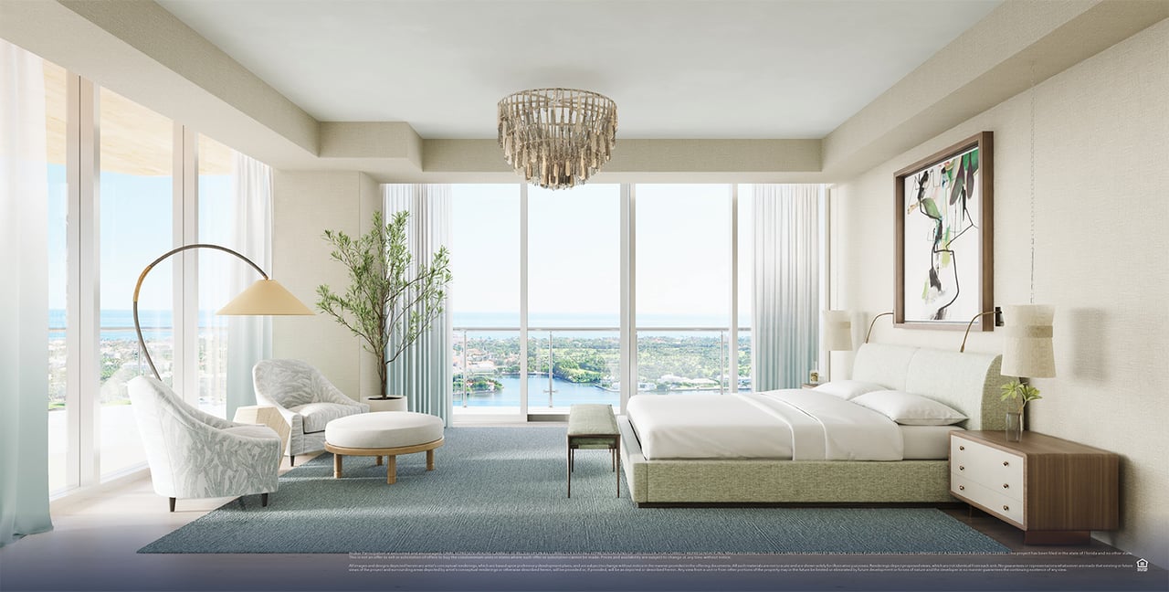 Forté on Flagler residence bedroom design with a hanging chair, pale furnishings and water views.