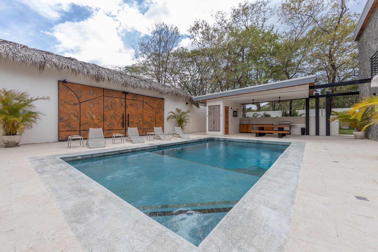 Casa Guacamaya Roja Lot B20 | Elegant 4-Bedroom Home with Pool & Outdoor Kitchen, Steps from Playa Grande Beach, Costa Rica