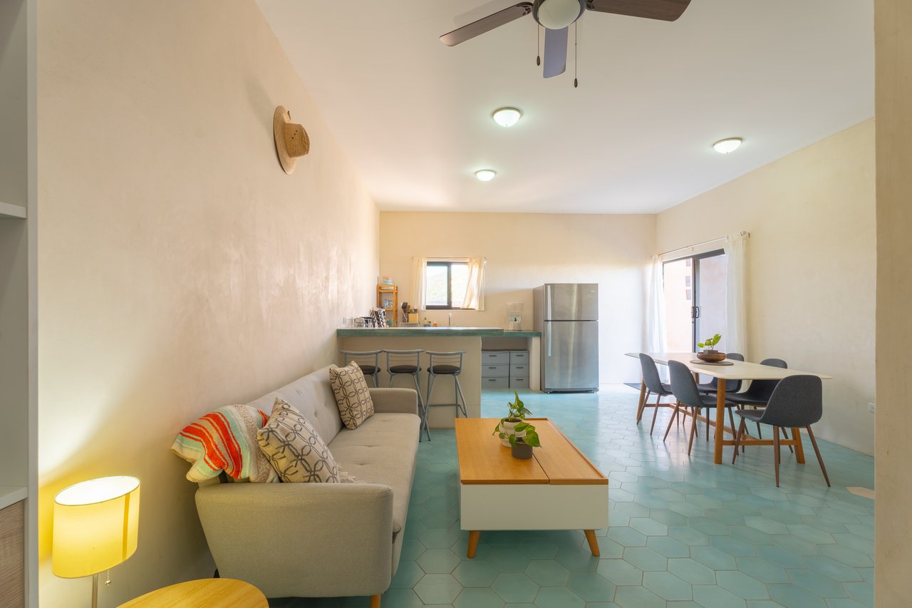 Main studio living room and kitchen at The Studio House in Villas de Cerritos with open layout and natural light in Cerritos, Baja California Sur.