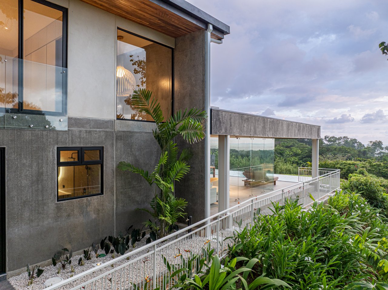 New contemporary tropical villa boasts with a movie theater and views of the iconic whale’s tail