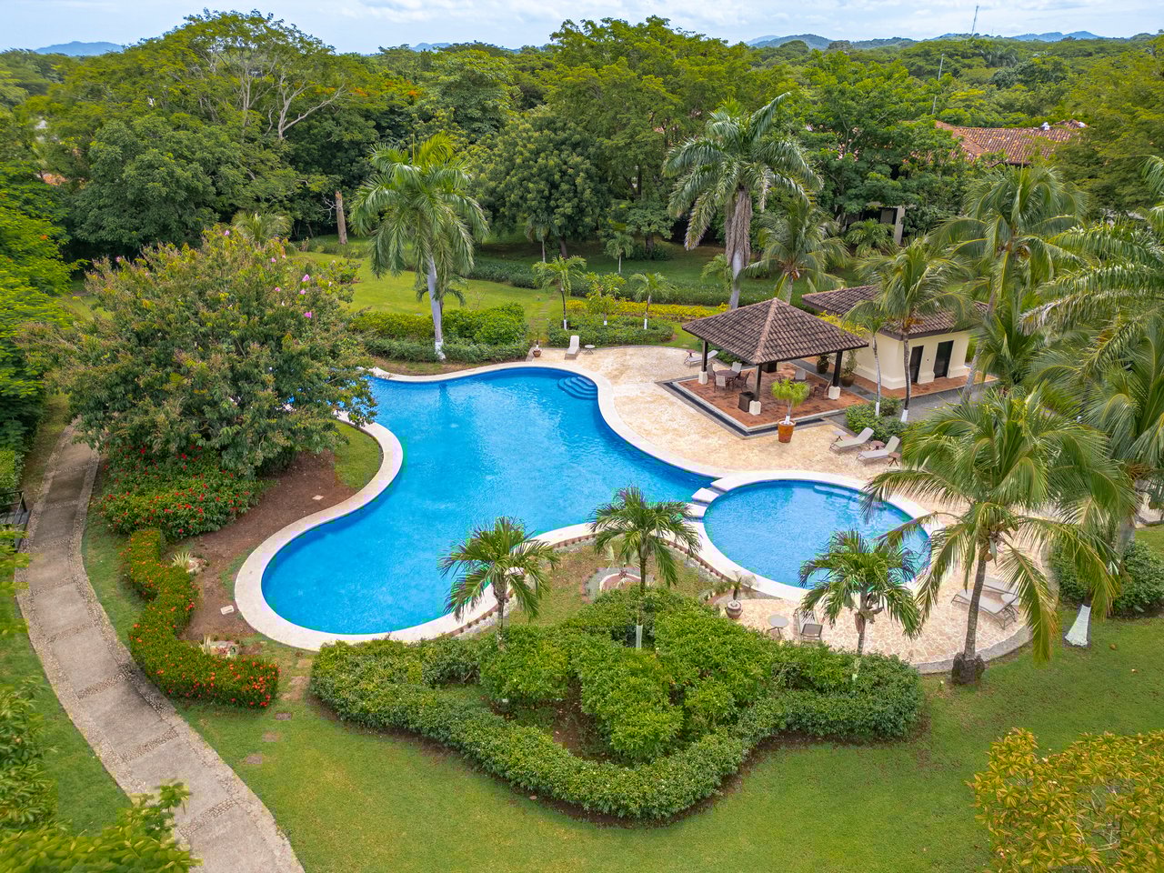 Lago de Palma Real 249 | Luxury 3-Bedroom Corner Condo with Panoramic Views in Hacienda Pinilla