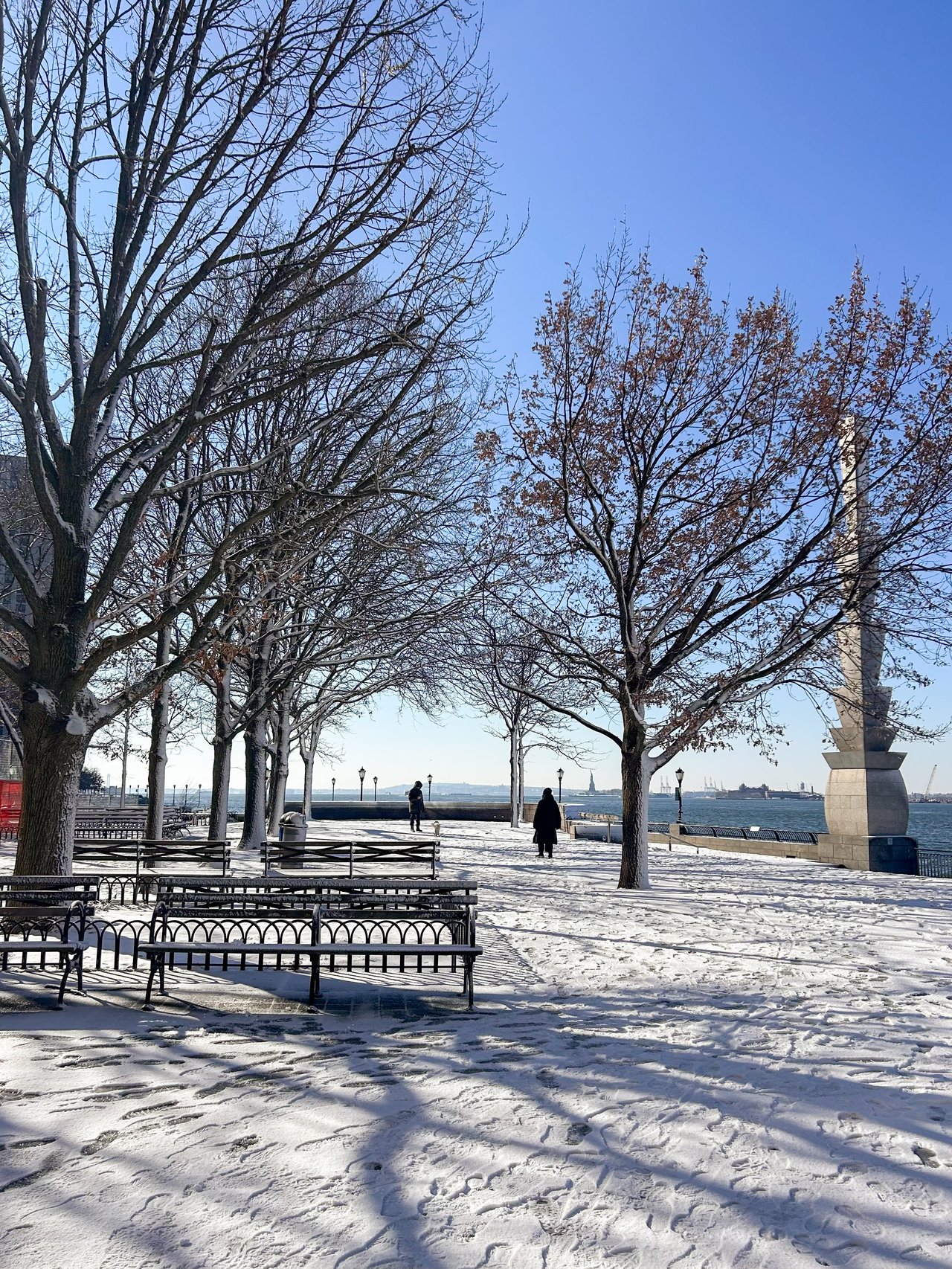 Parents and adult child having a calm conversation about buying a home in New York City