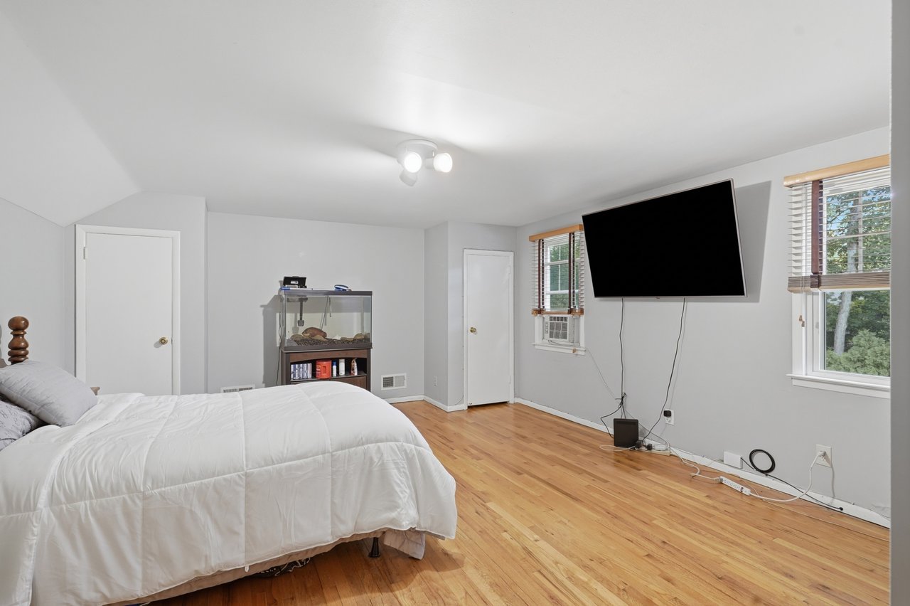 Large bedroom facing backyard