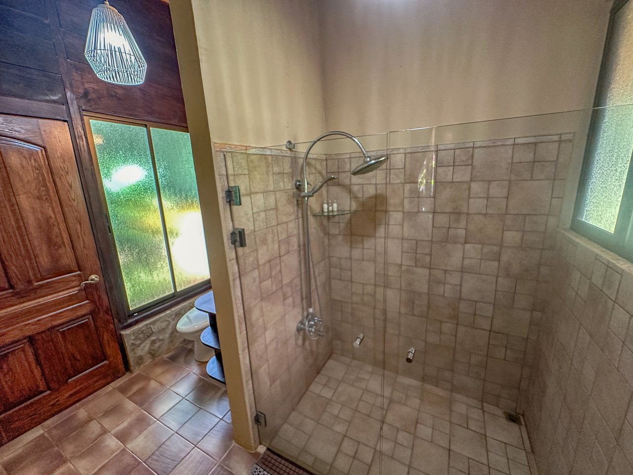 A riverfront 3-bed home on a large property In Ojochal, Costa Rica