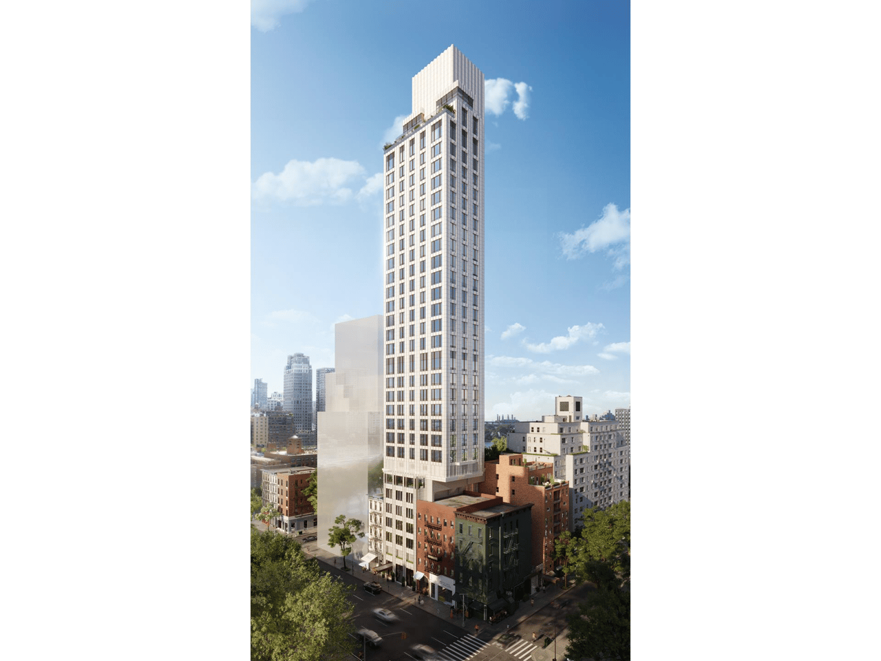 The 74 high-rise tower with a sculpted white crown above surrounding city buildings.