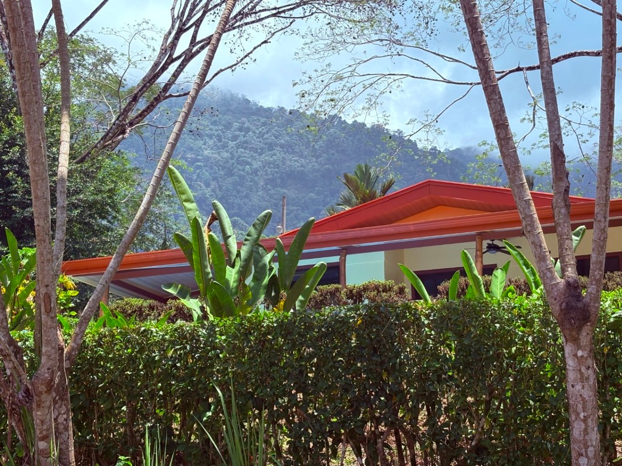 Move in ready 2 bedroom / 2 bathroom home with window ocean view and pool in Ojochal.