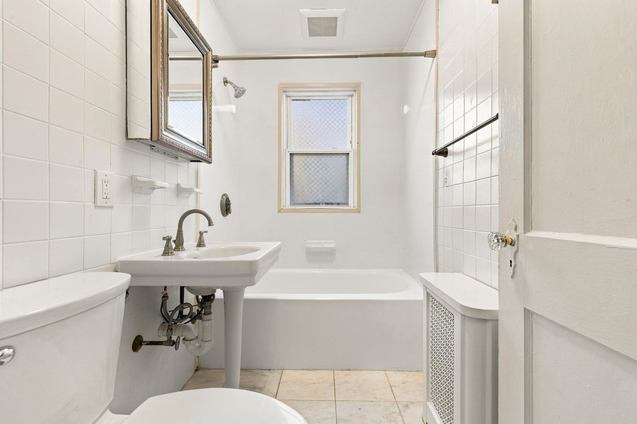 A Rare Two-Family Generational Asset with a Private Entrance to the Arnold Arboretum