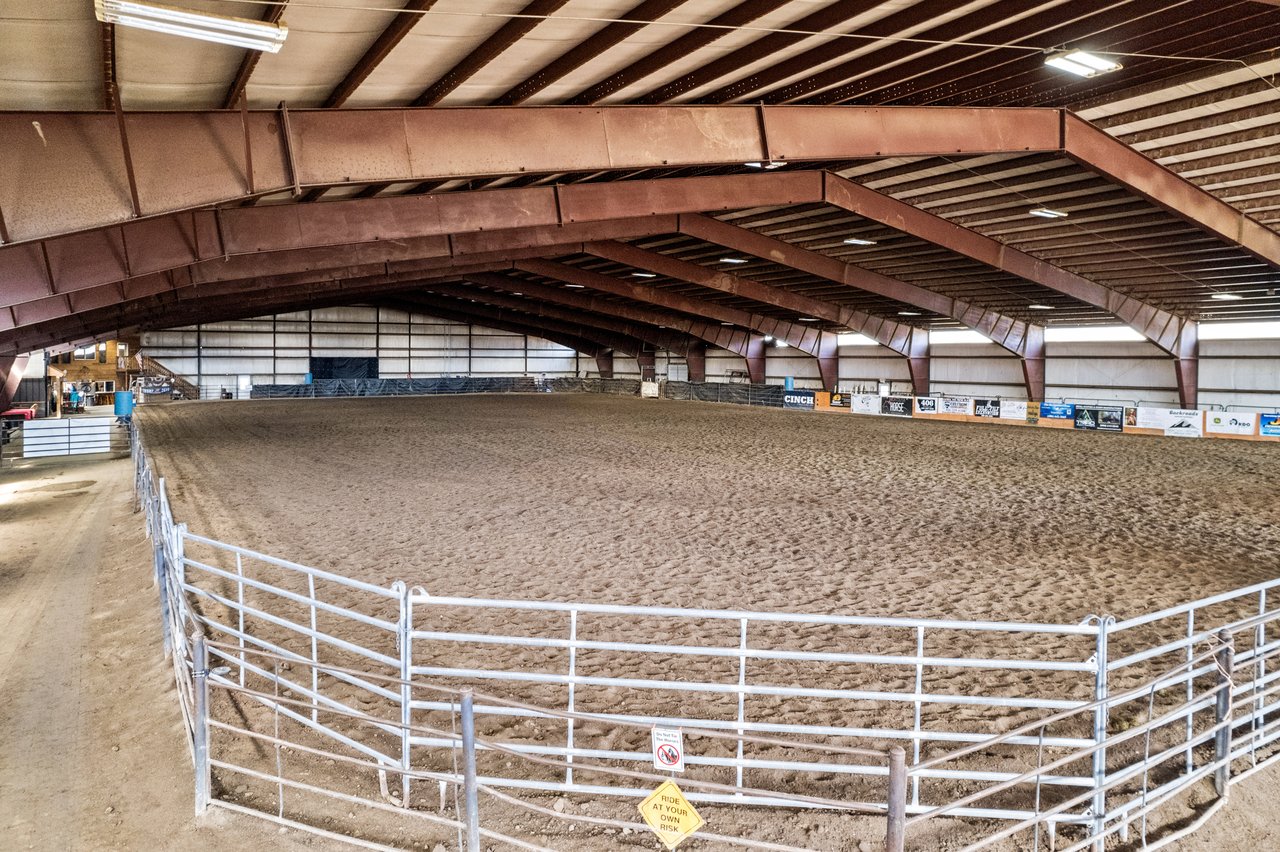 Interior wide view of the 300 foot indoor riding arena at 5C Arena & Event Center Montana