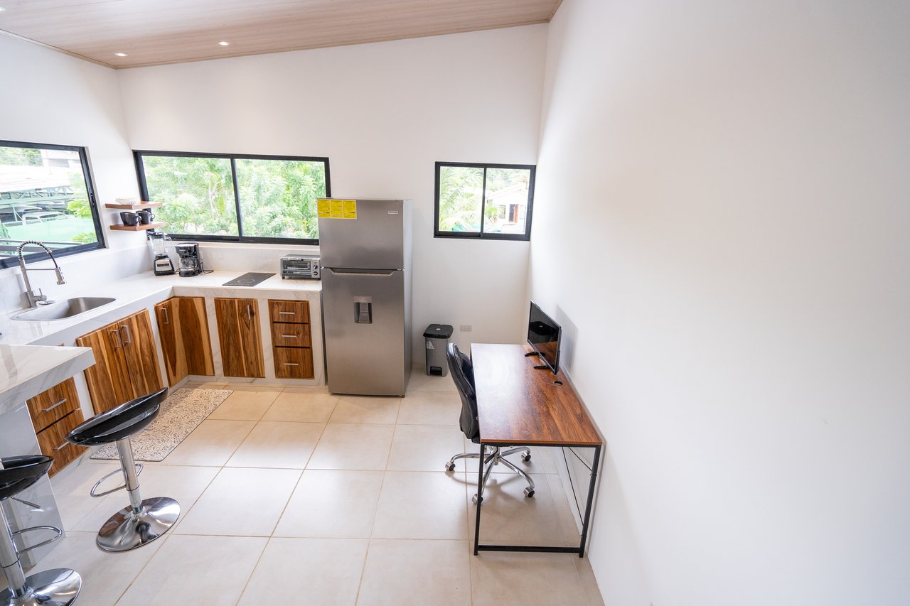 A House With An Upper Live-In Suite & Two Fully Serviced Downstairs Rental Apartments Less Than 1 km From The Entrance to Marino Ballena National Park