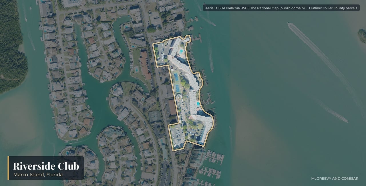Aerial view of Riverside Club on Marco Island, Florida, six mid-rise buildings and the 77-slip marina on the Marco River at 1085 Bald Eagle Drive