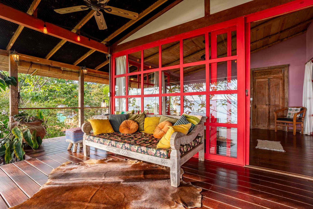 A Handcrafted Residence Immersed in Nature Above the Canopy Ocean View Architectural Home