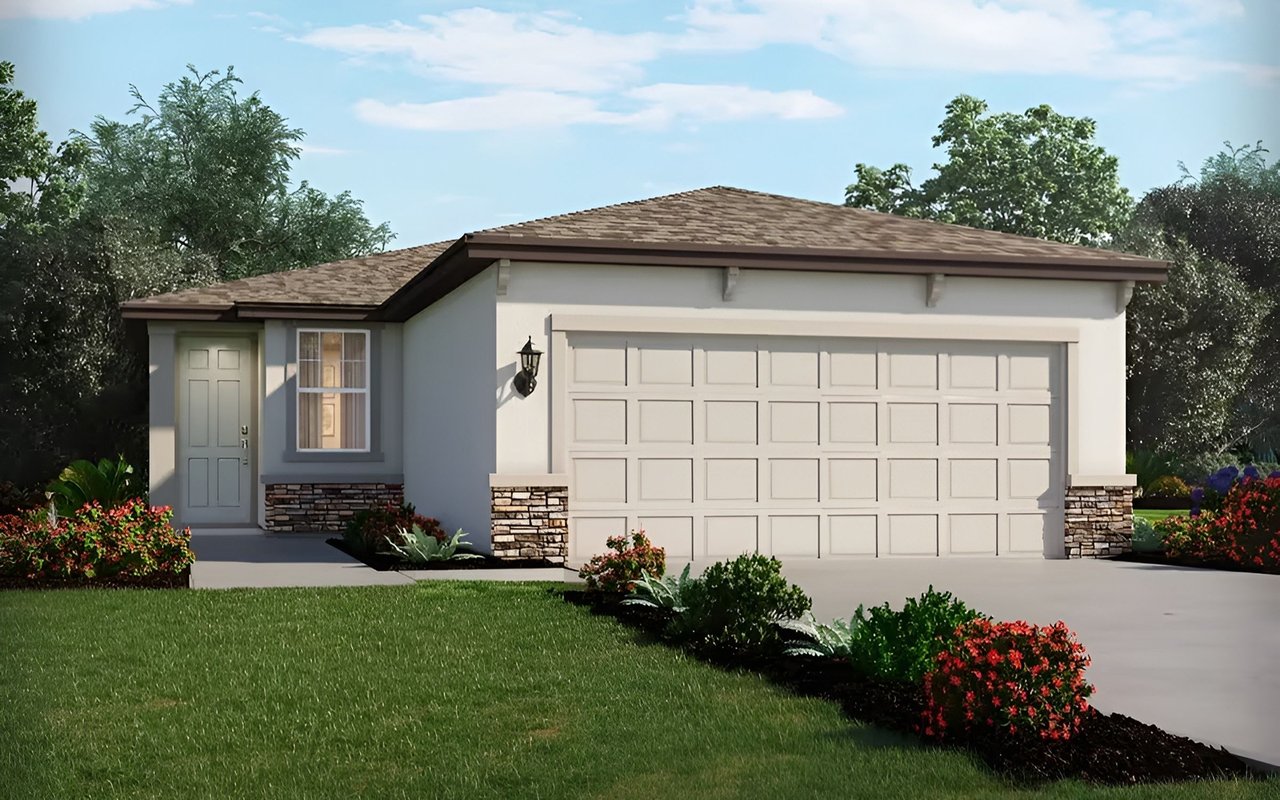 Single-story gray home with stone accents, a two-car garage, and landscaped flower beds.