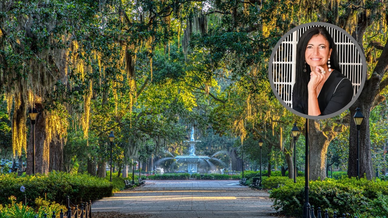 Tree-lined park walkway leading to a fountain, with a woman’s portrait inset at the upper right.